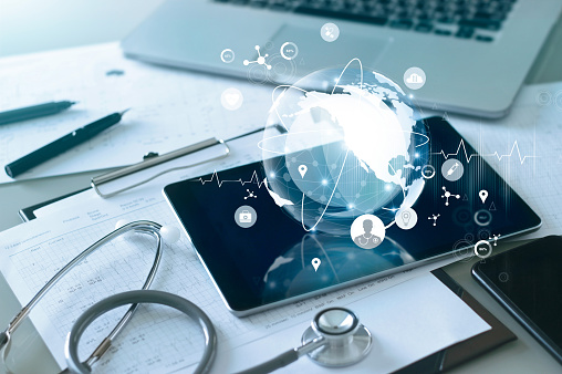 istockphoto-1195694298-170667a Medical global networking and healthcare global network connection on tablet, Medical technology.